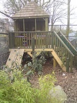 natural play design for well being - a tree house allows children to explore nature, up close